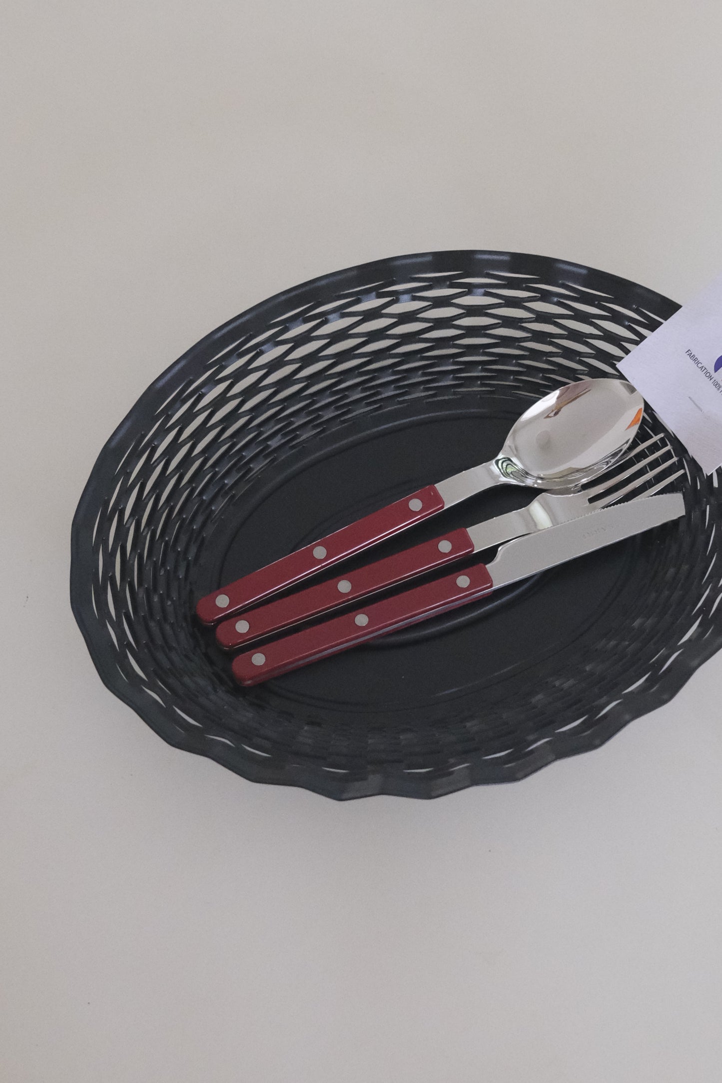 Small and large matte black woven bread baskets