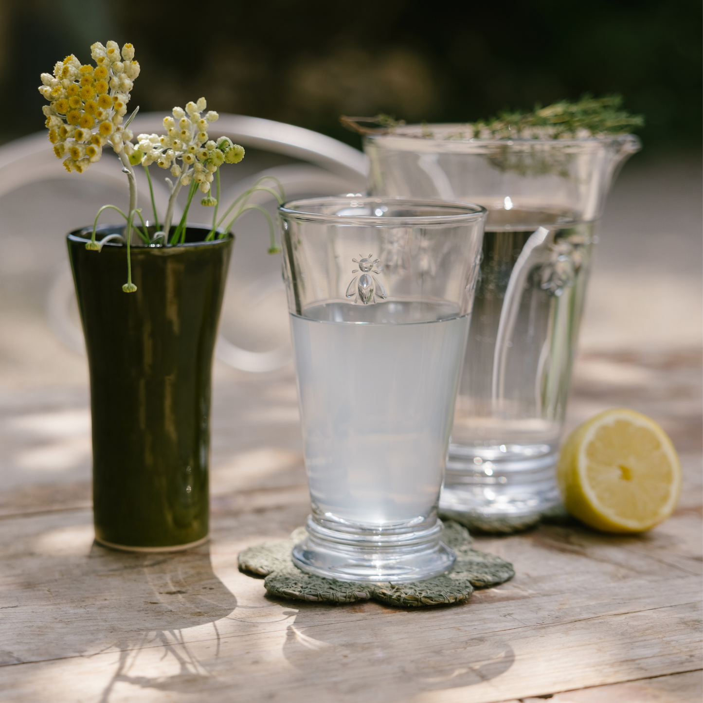 La Rochère Bee iced tea glasses arranged on a summer table