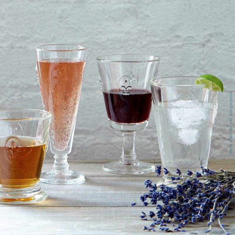 La Rochère Fleur de Lys wine glasses set for a dinner toast