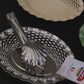 Oval stainless steel bread basket Roger Orfevre in use at dining table