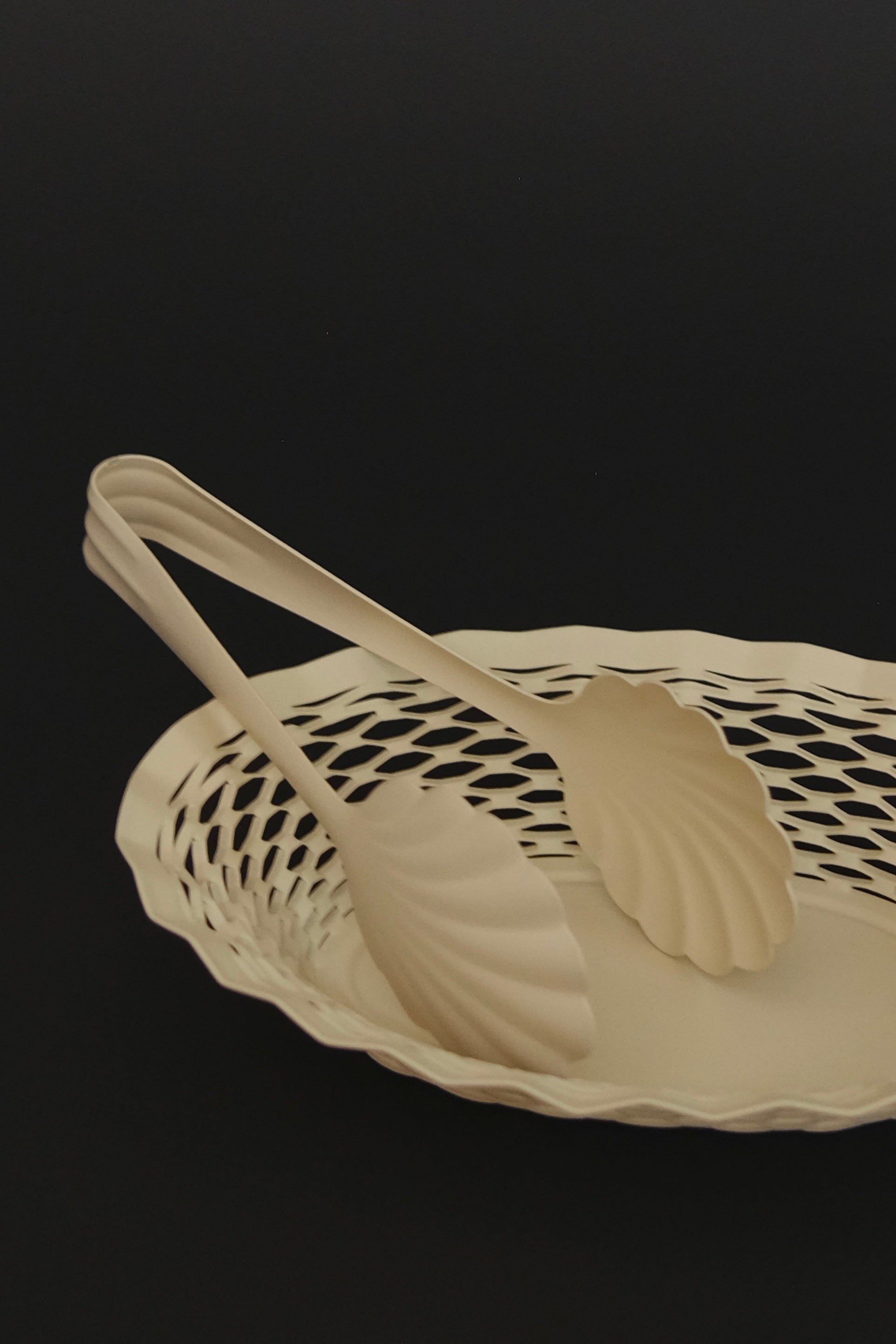 Roger Orfevre vanilla bread basket with rolls at dining table