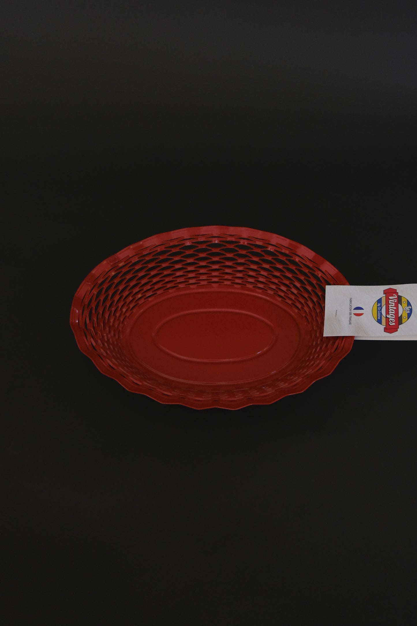 Roger Orfevre red bread basket overhead view artisan tableware