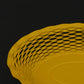 Roger Orfevre large pollen yellow bread basket styled on dining table