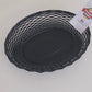 Matte black woven artisan bread basket on table