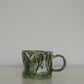 Matcha green ceramic coffee mug from HAUS HAUS on white background