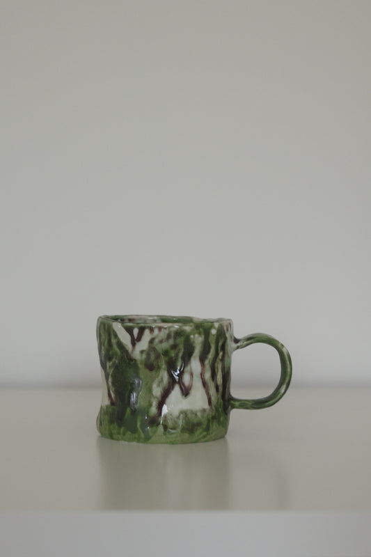 Matcha green ceramic coffee mug from HAUS HAUS on white background