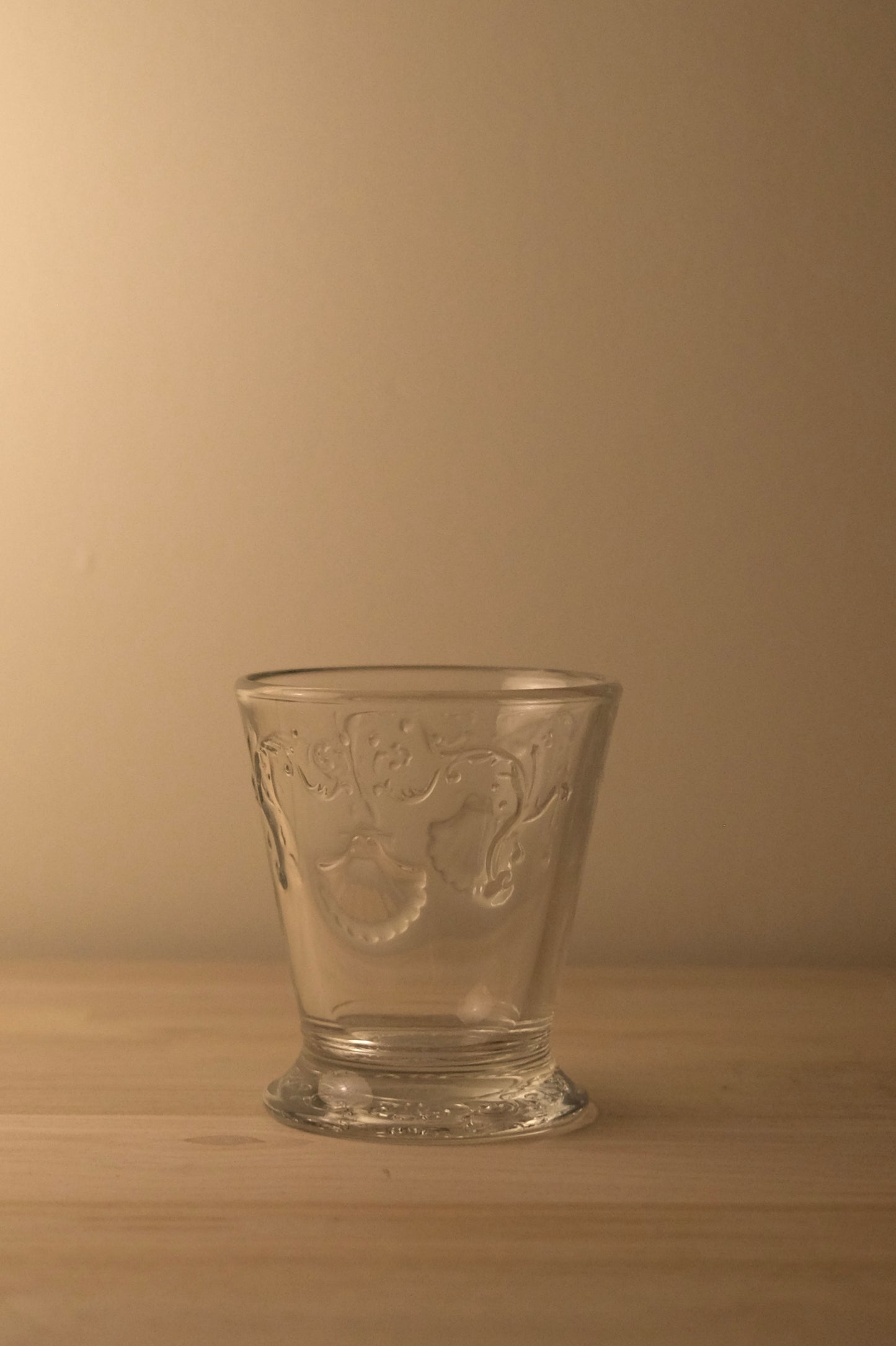 La Rochère Versailles tumbler with ornate French relief pattern in clear glass